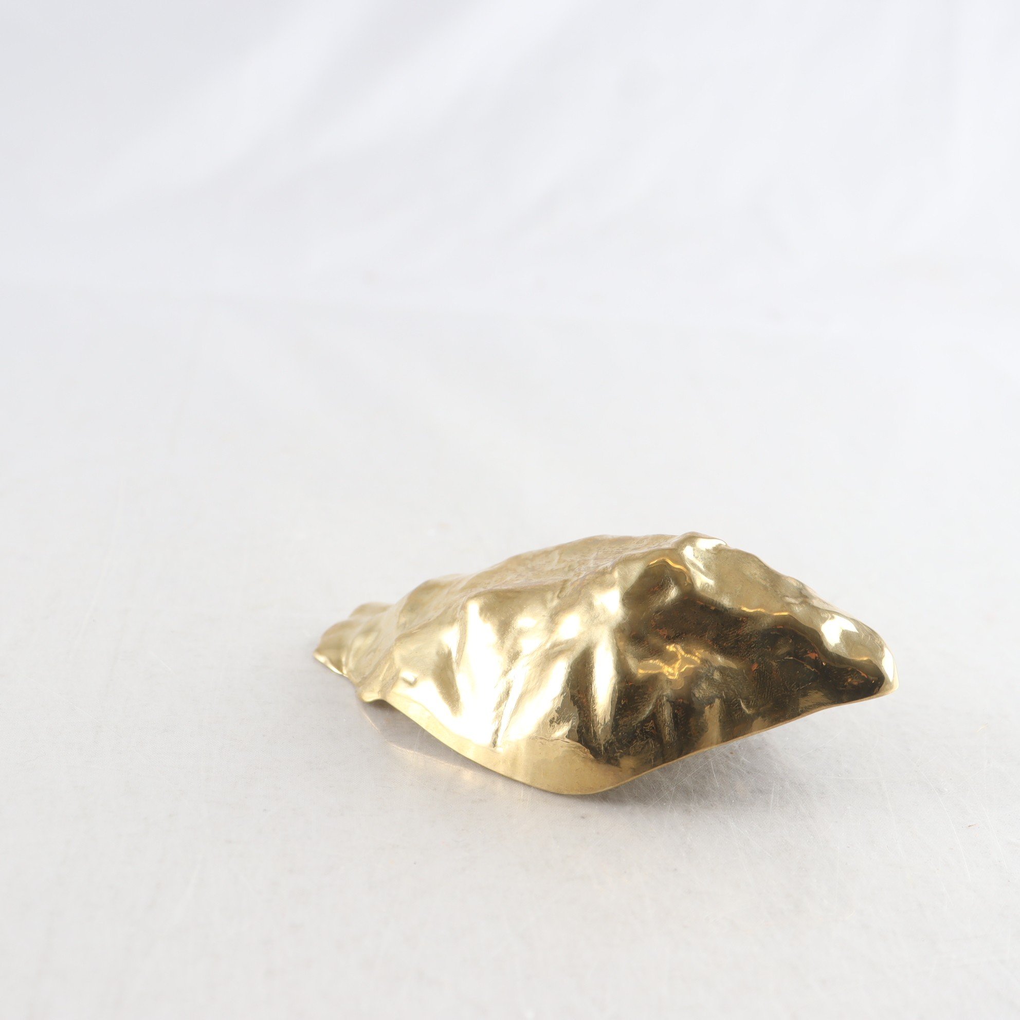 Flasköppnare, Skultuna, ”Oyster”, Benjamin Kurpatow, mässing.
