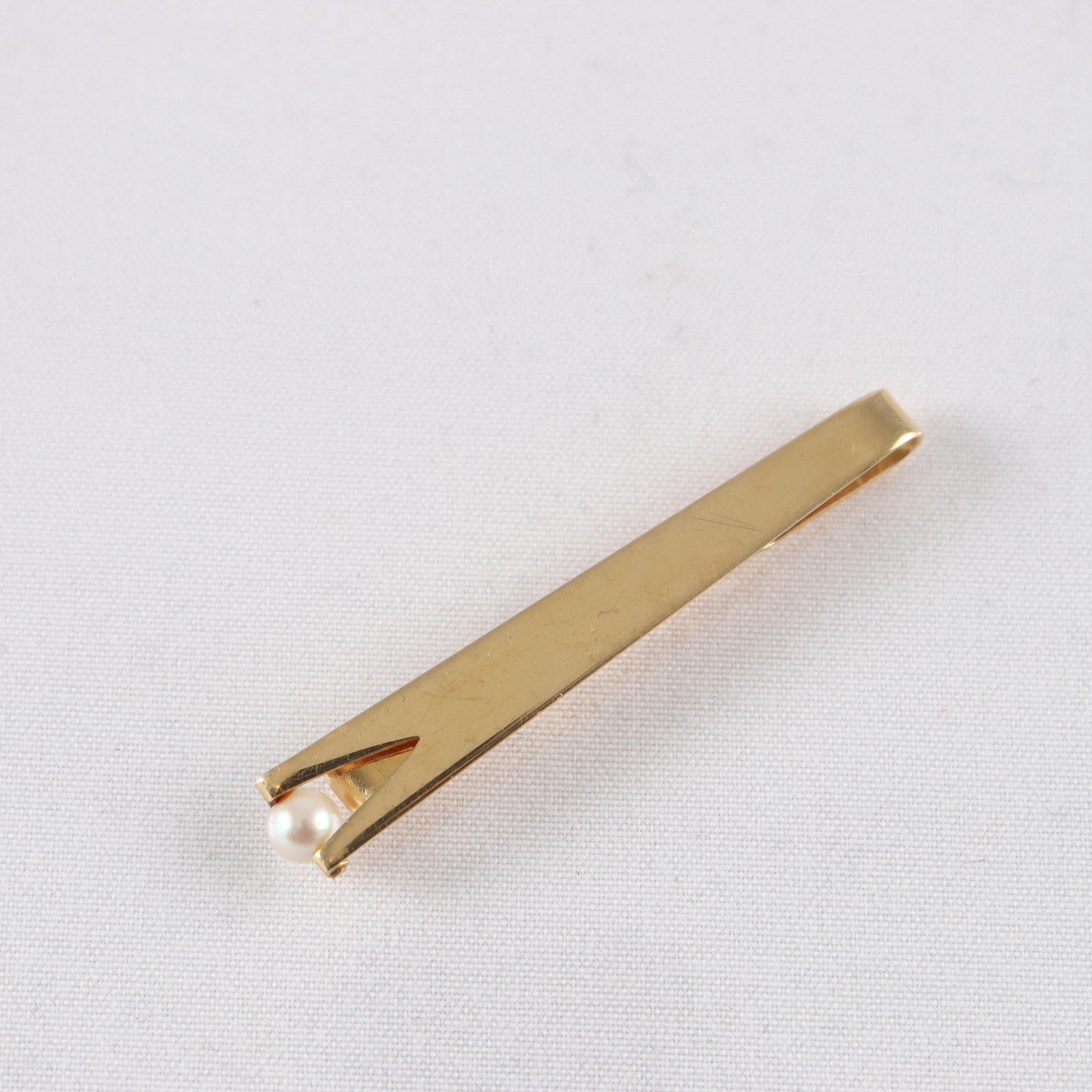Slipsnål, Alton, 1965, 18k guld, pärla.