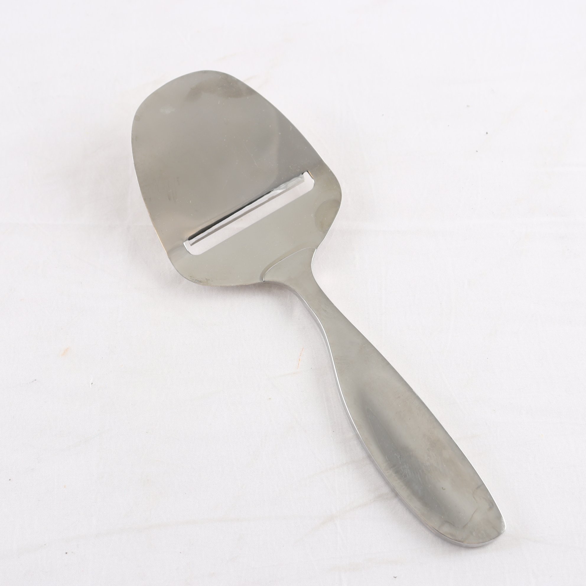 Osthyvel, rostfritt stål, Alfredo Häberli, Georg Jensen, Danmark