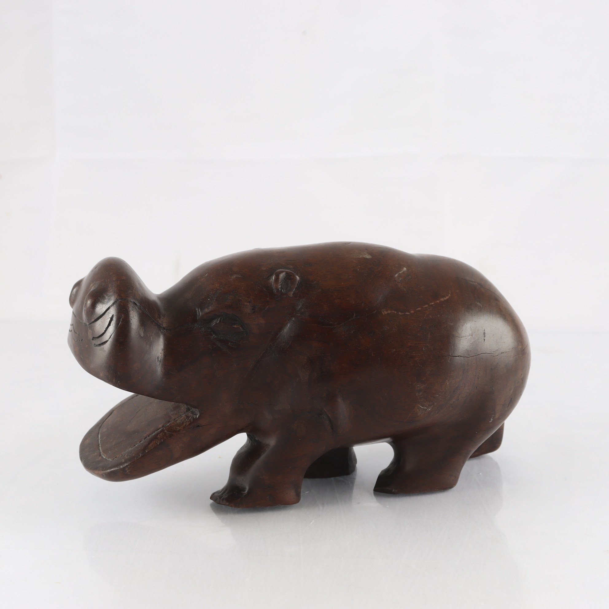 Figurin, trä, flodhäst, 1900-tal.