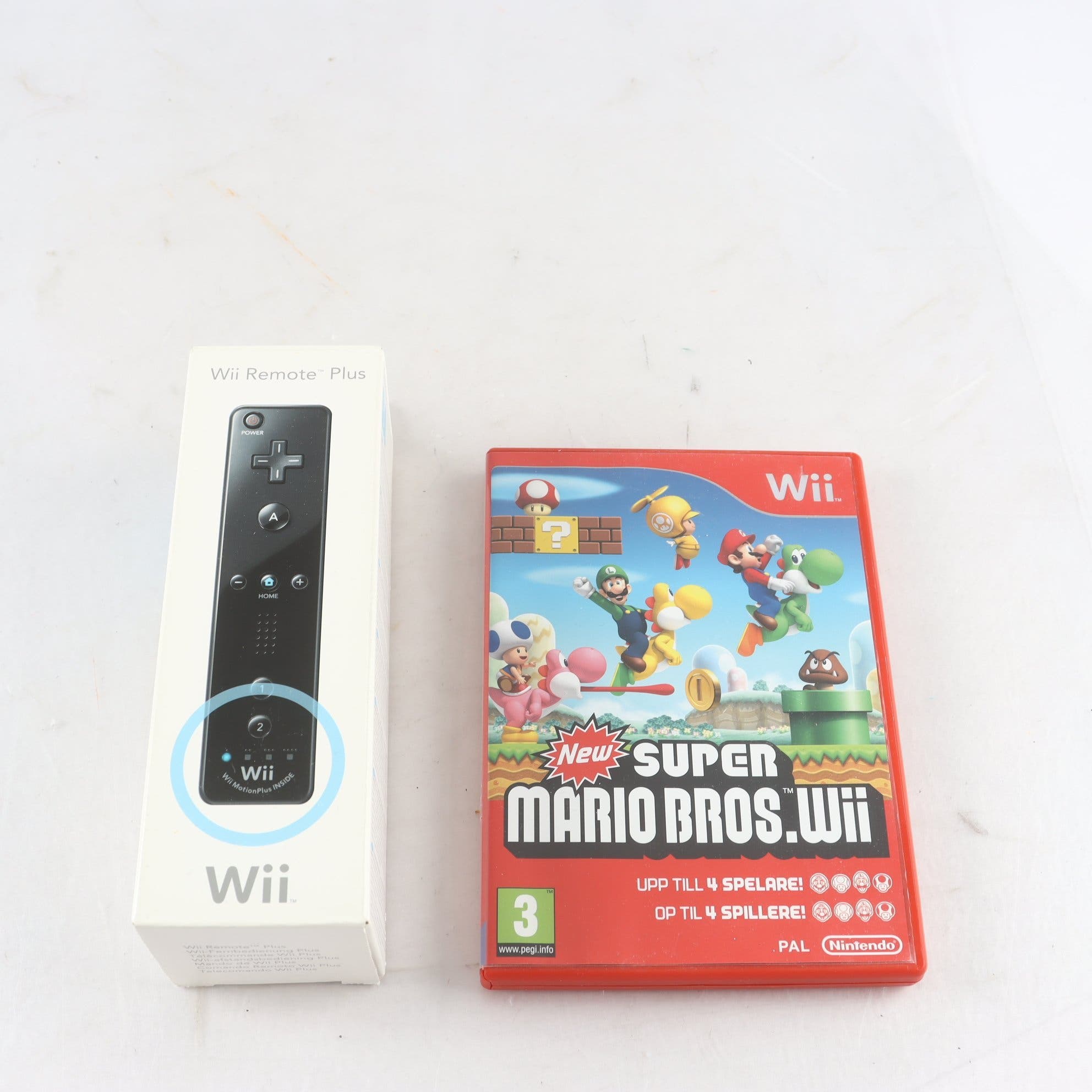 Spel och handkontroll, Nintendo Wii.
