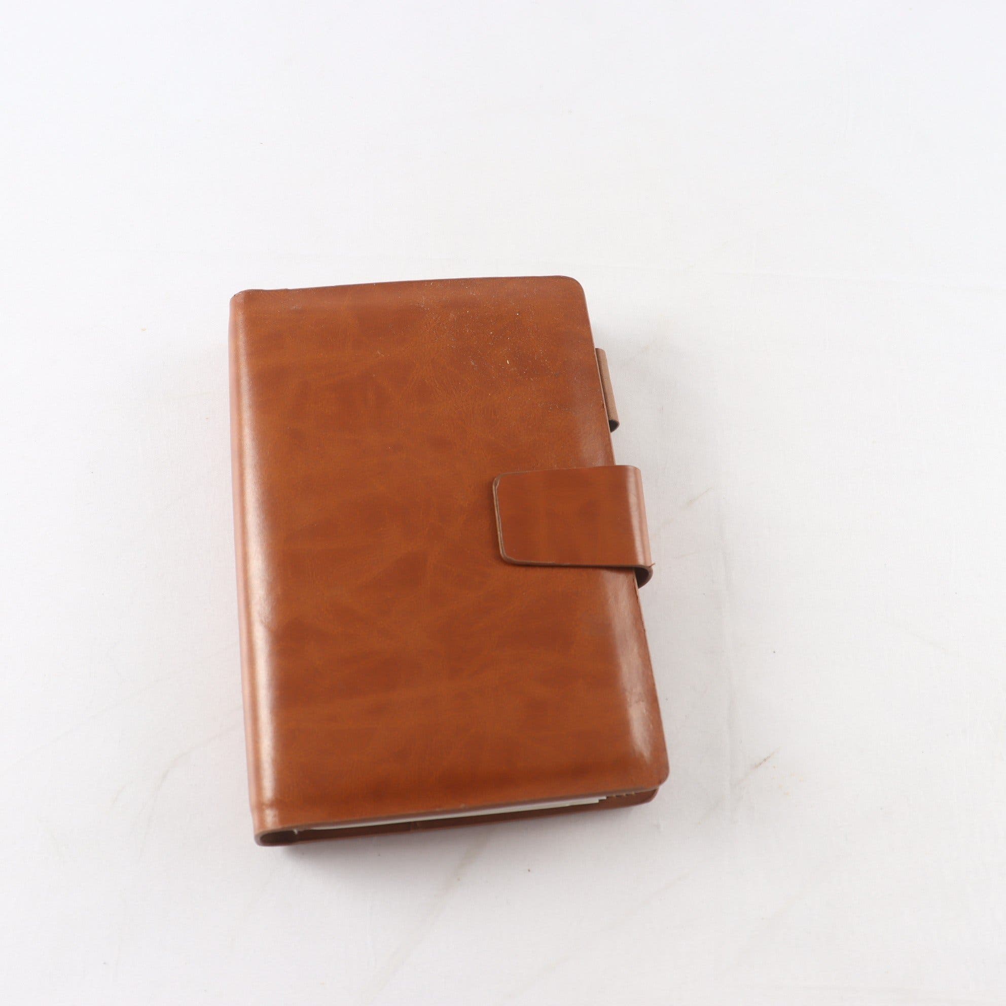 Filofax i brunt konstläder