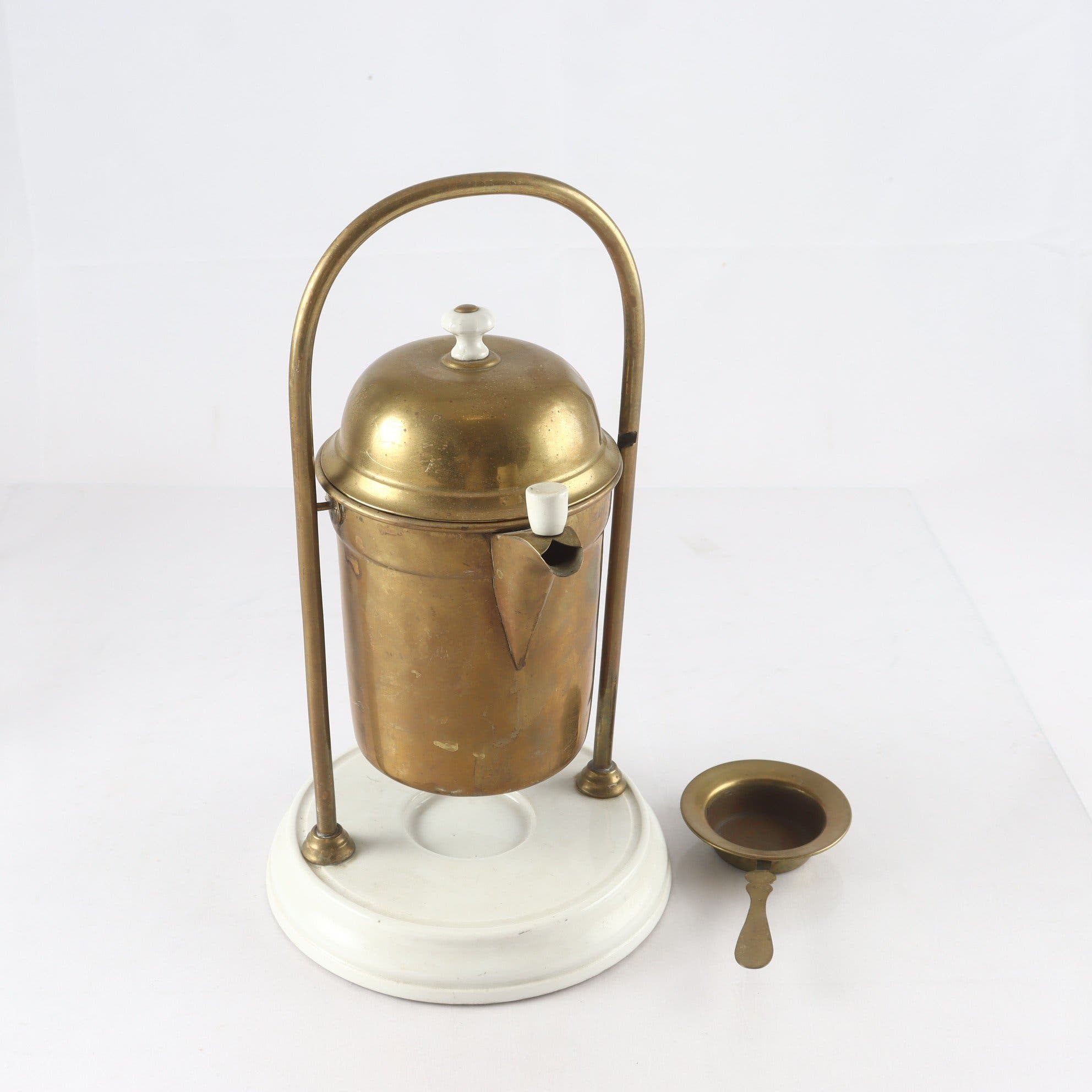 Perkulator med värmeställ, mässing, porslin, tidigt 1900-tal. Samfraktas ej.