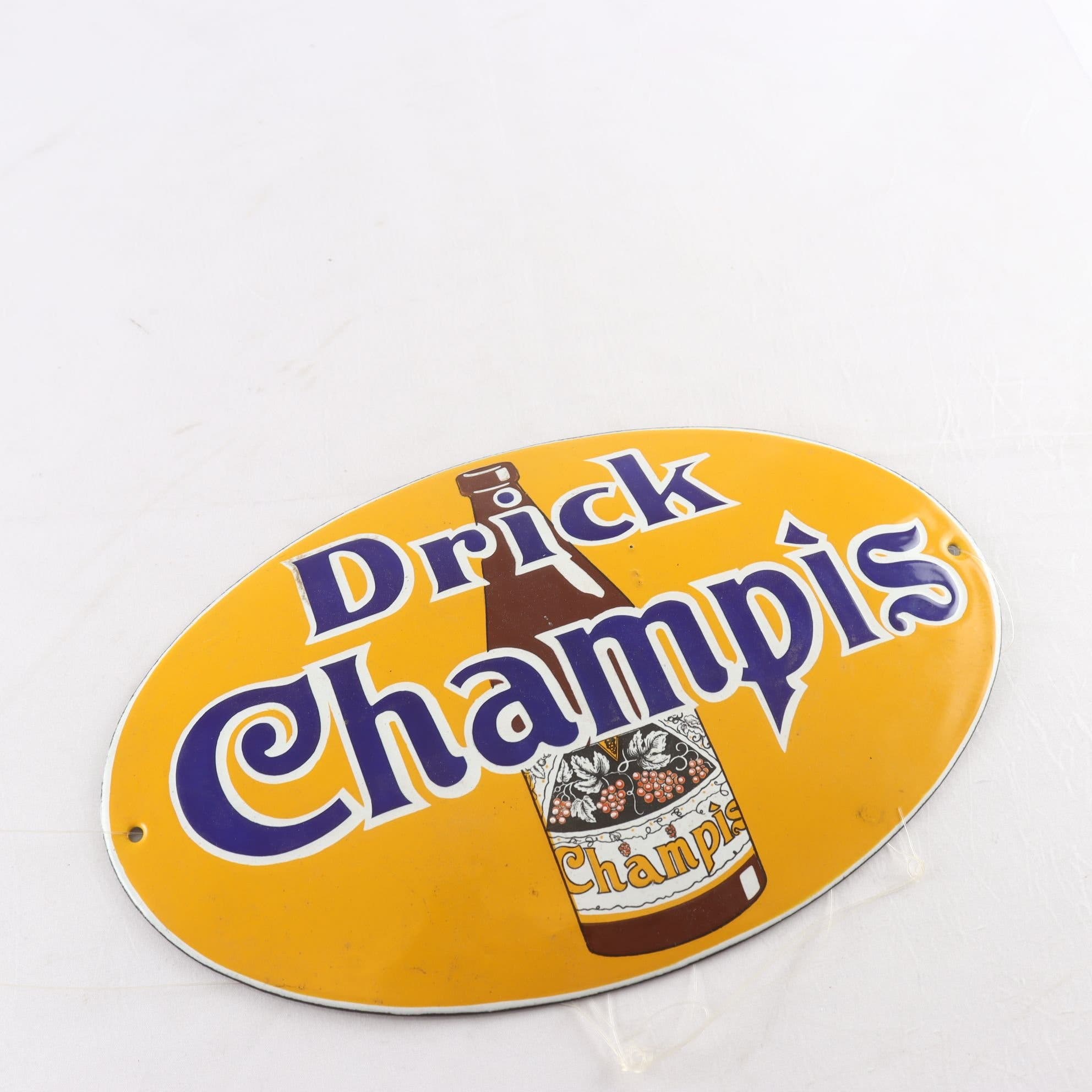 Emaljskylt, ”Drick Champis”.