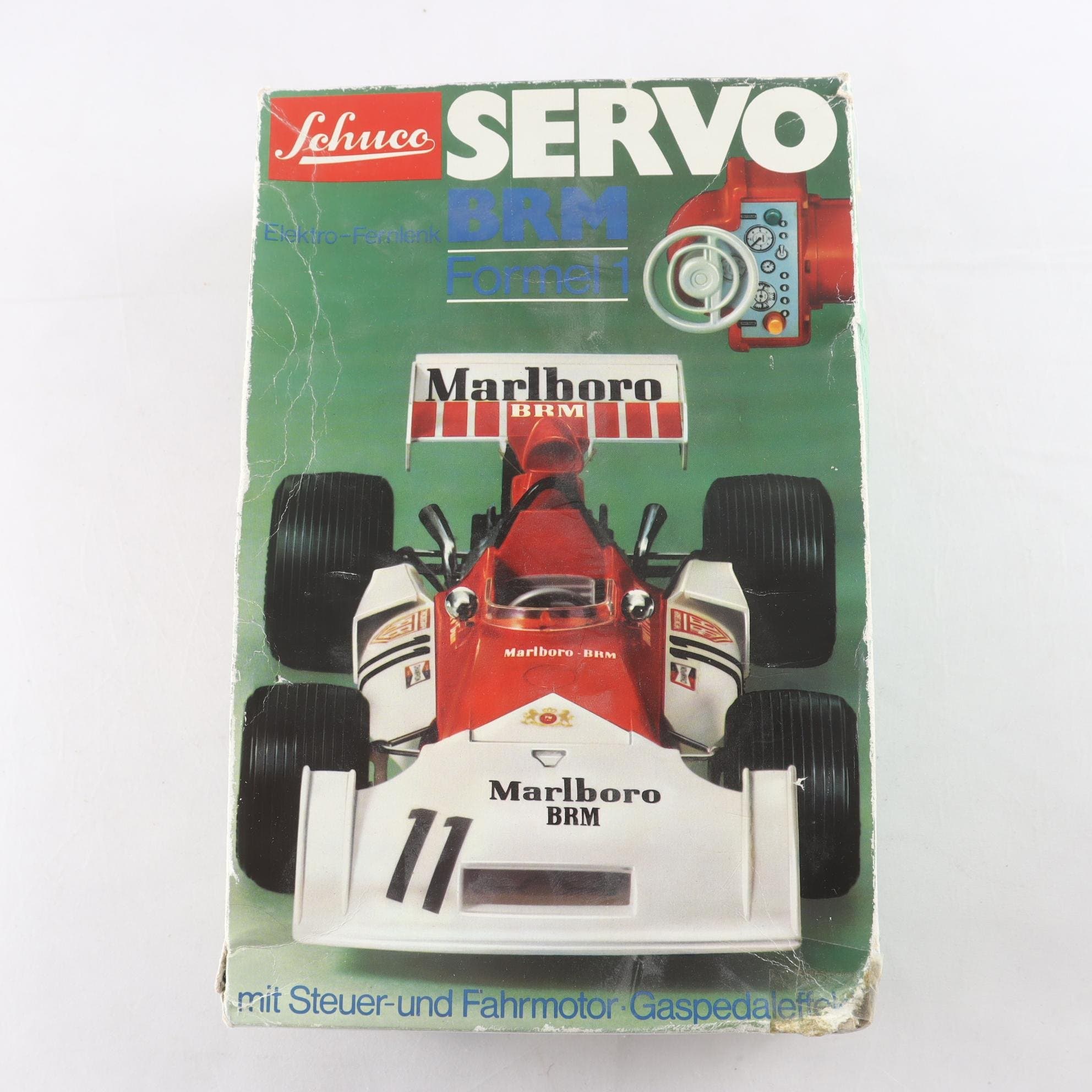 Radiobil, Schuco servo,formel-1 brm,i org kartong, retro.