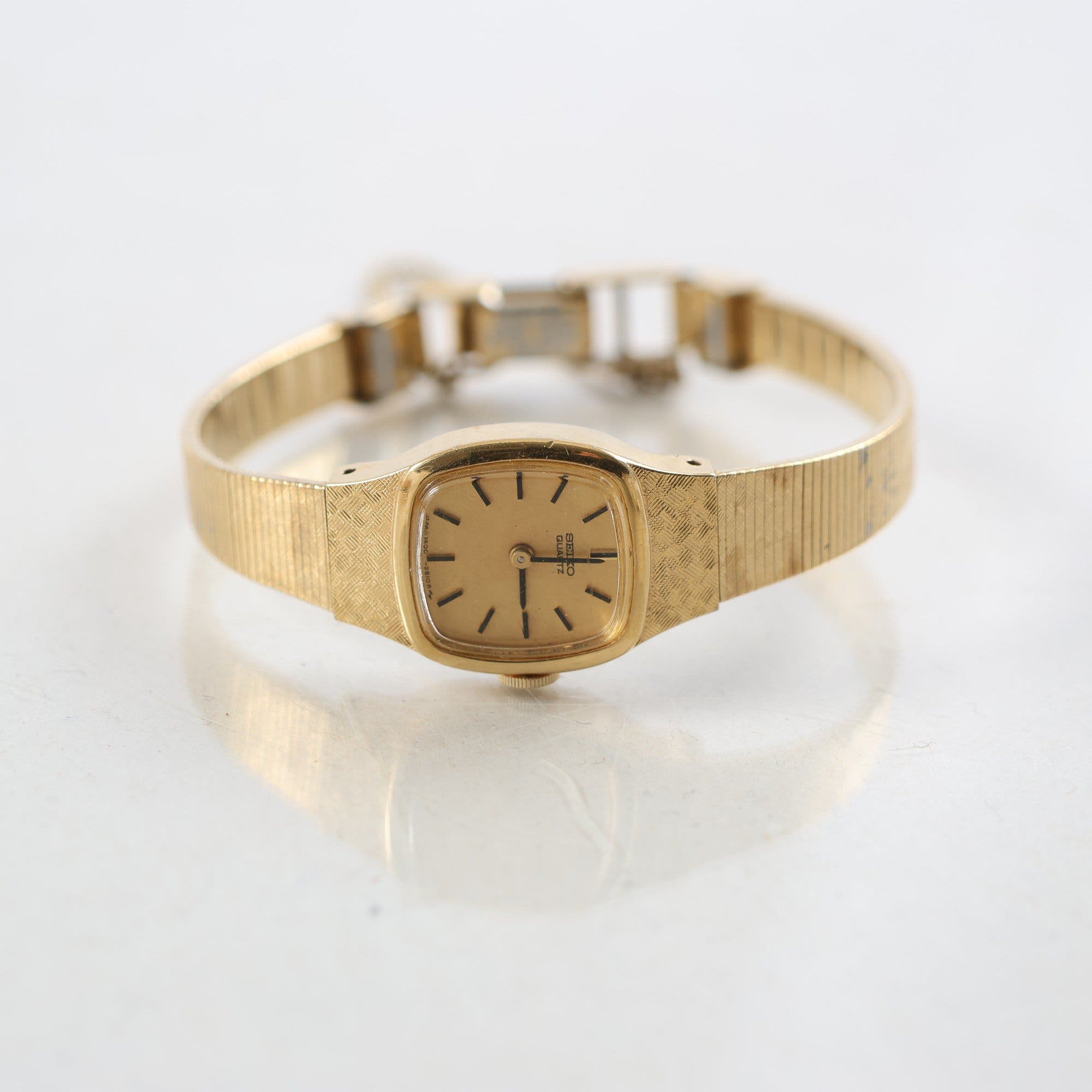 Armbandsur, Seiko quartz, guld 18k