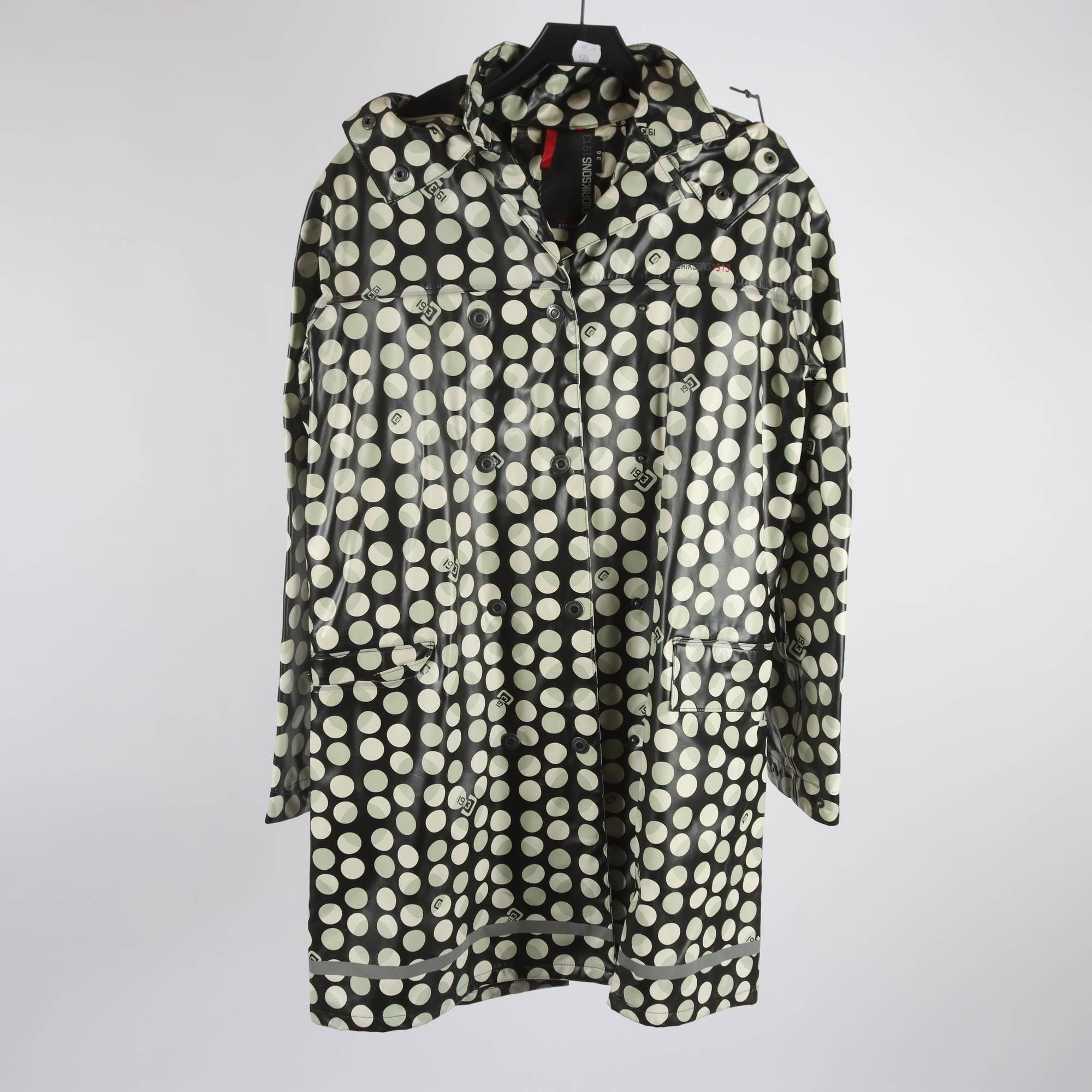 Regnkappa, Didriksons, prickig, vit, svart, stl. 36.