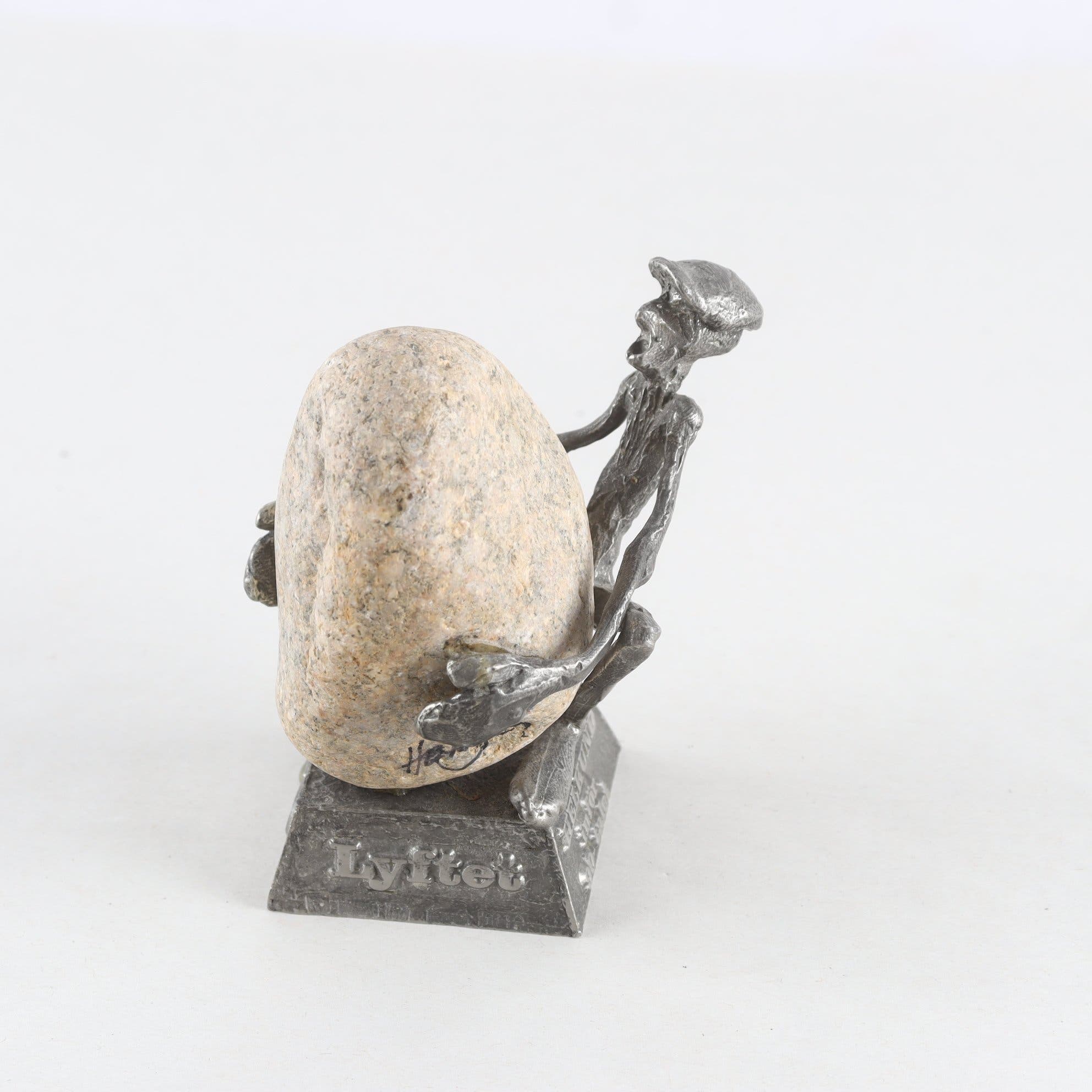 Skulptur, tenn, sten, ”Lyftet”, Henry Gustafsson