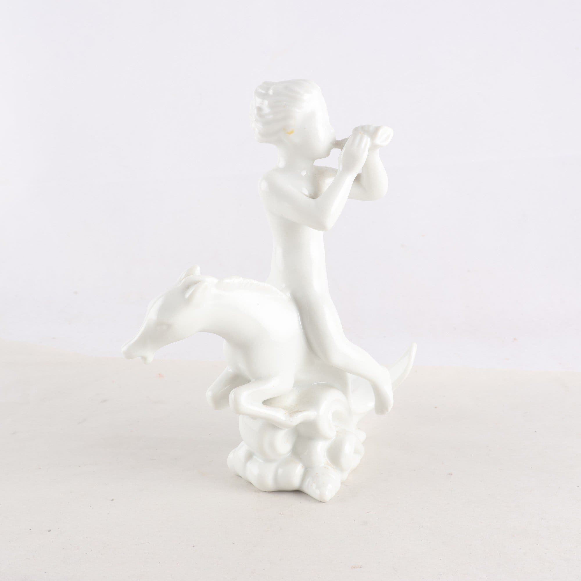 Figurin, pojke på en sjöhäst, Harald Salomon, Rörstrand
