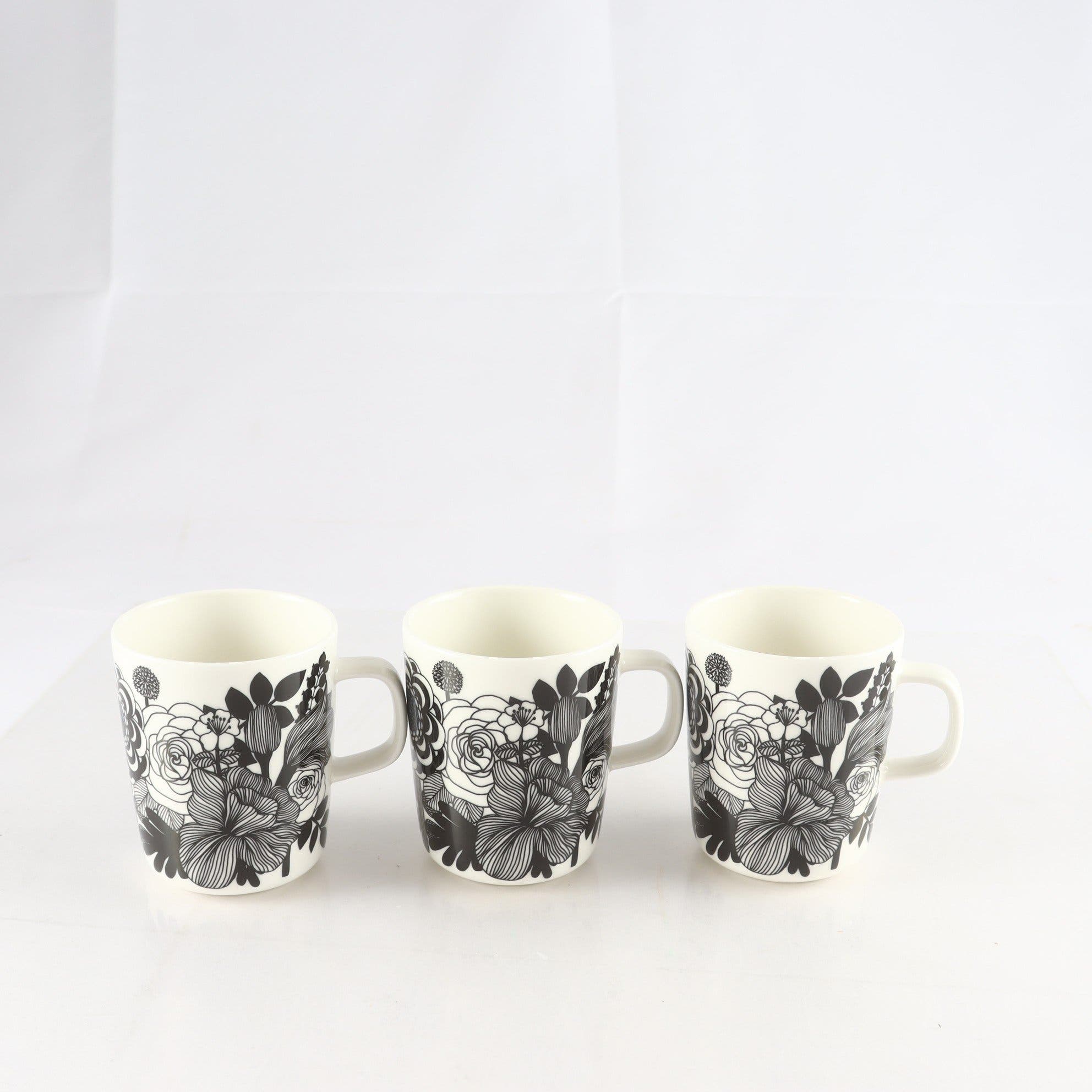 Kaffemuggar, vit stengods, ”SIIRTOLAPUUTARHA”, Marimekko, 3 st