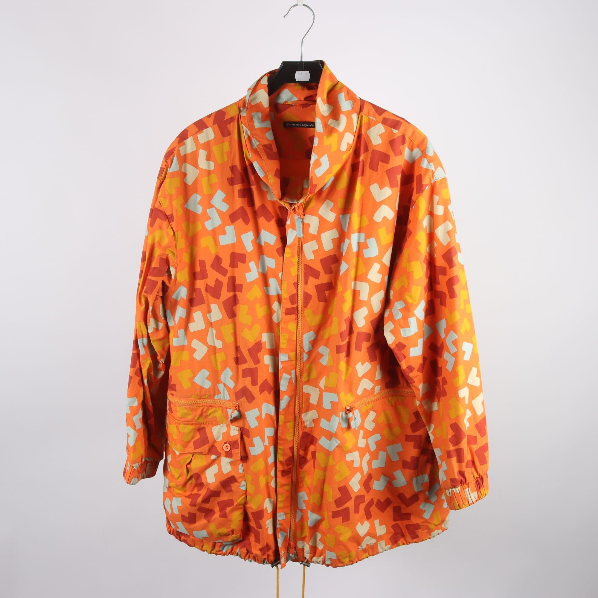Regnjacka, Gudrun Sjödén, mönstrad, orange, stl. XL.
