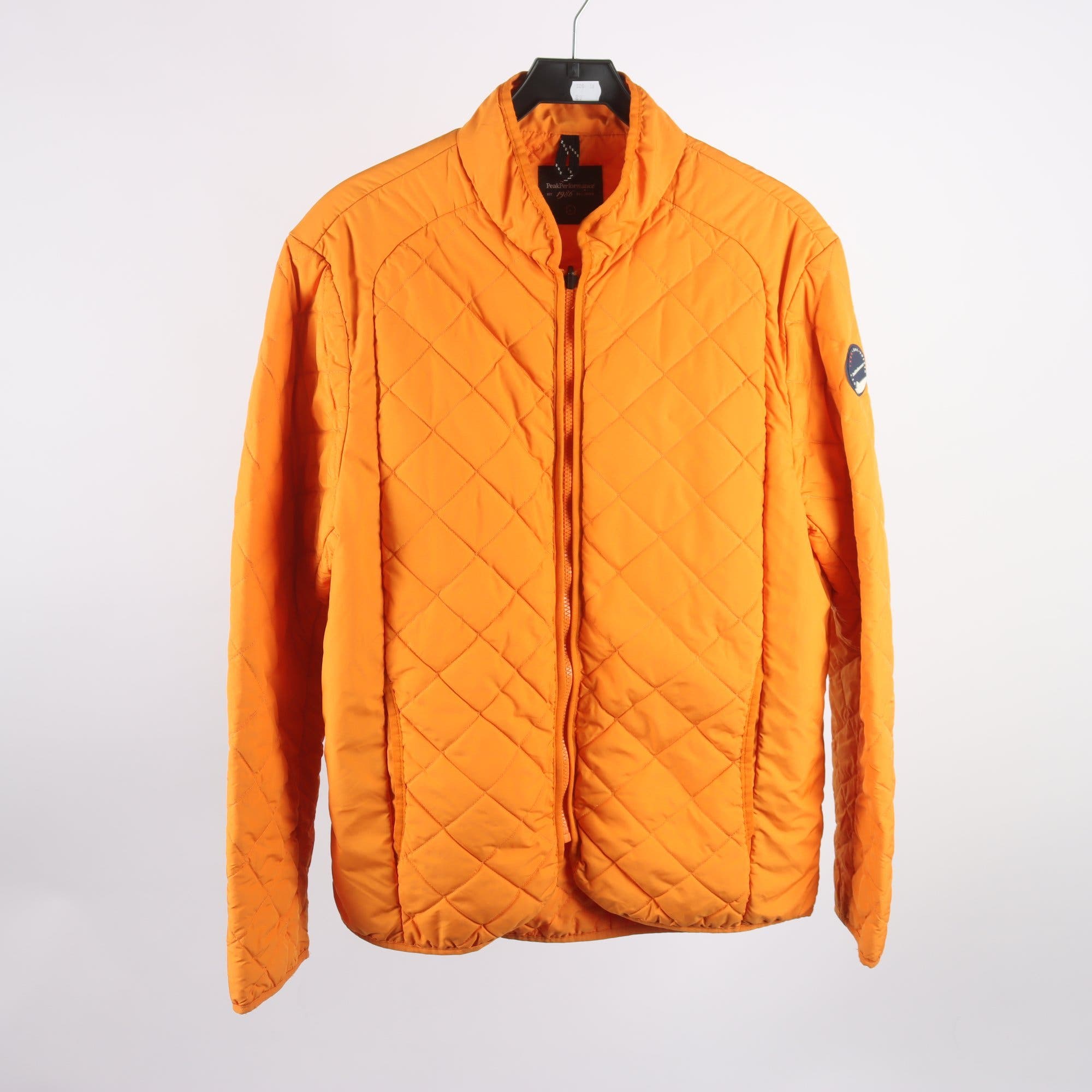 Täckjacka, Peak Performance, orange, quiltad, stl. L.