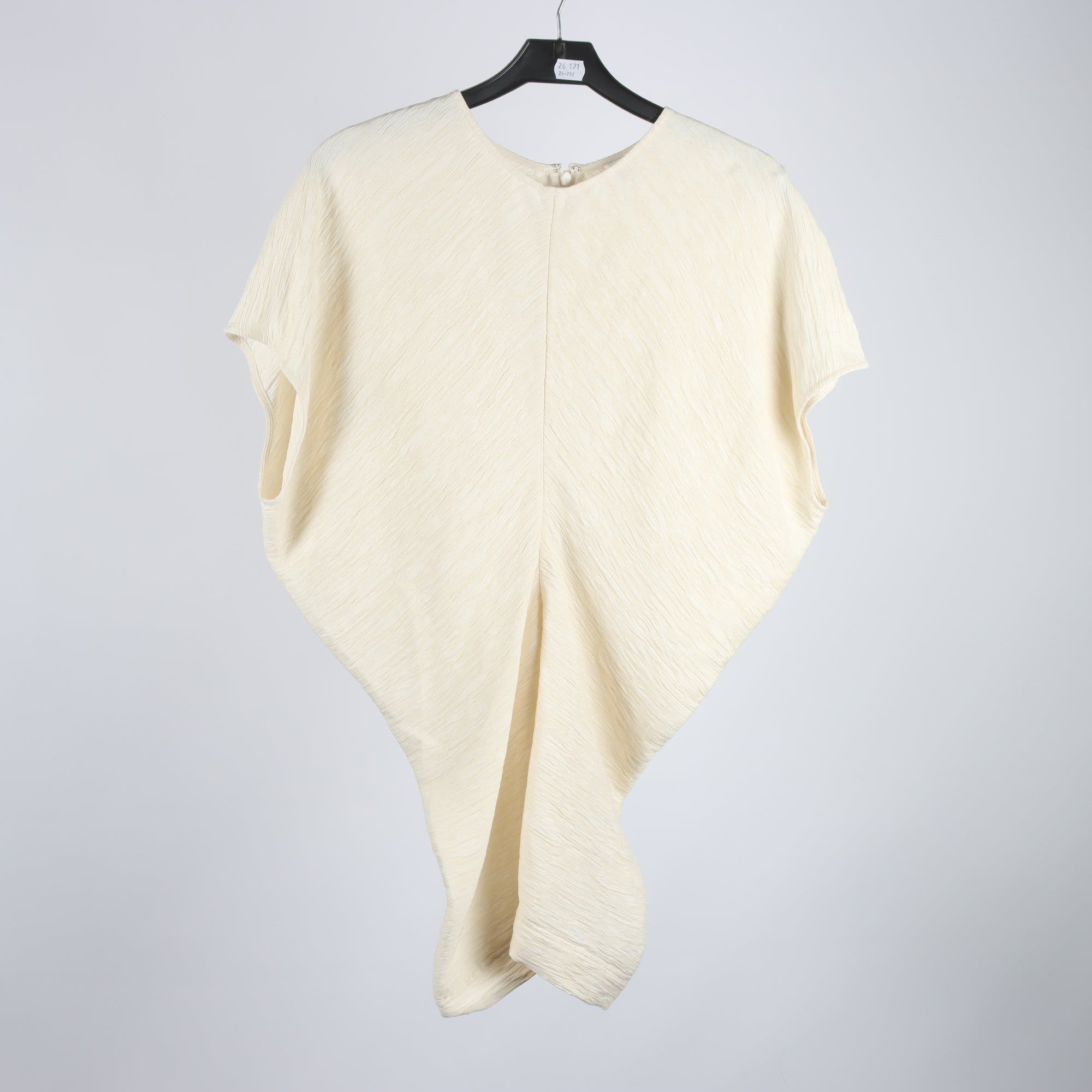 Blus, Totême, stl. 40
