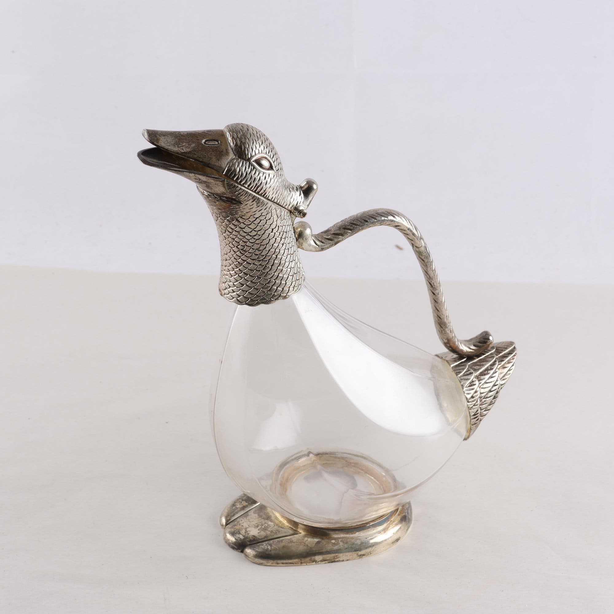 Vinkaraff, form av anka, glas och metall