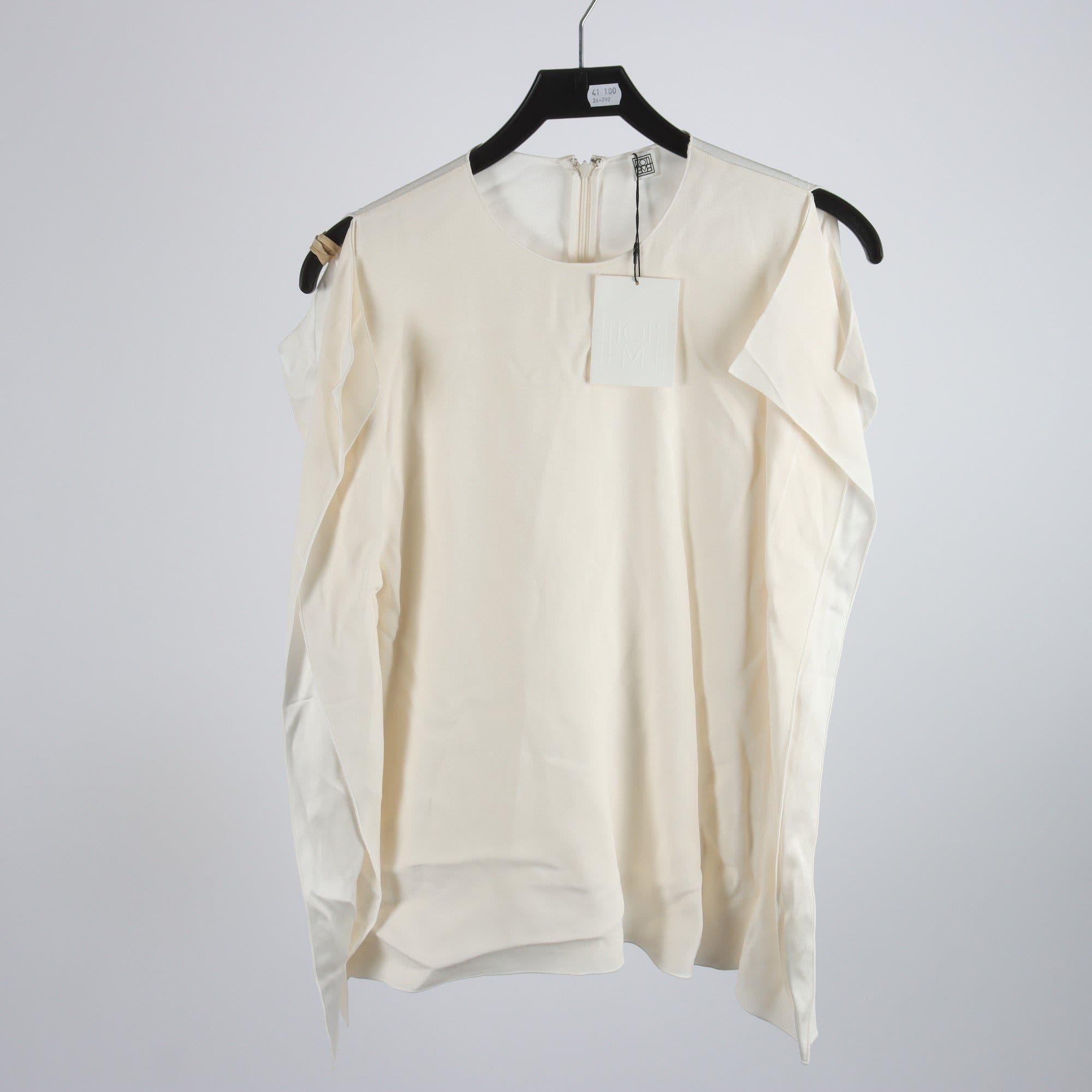 Blus, Totême, stl. 40