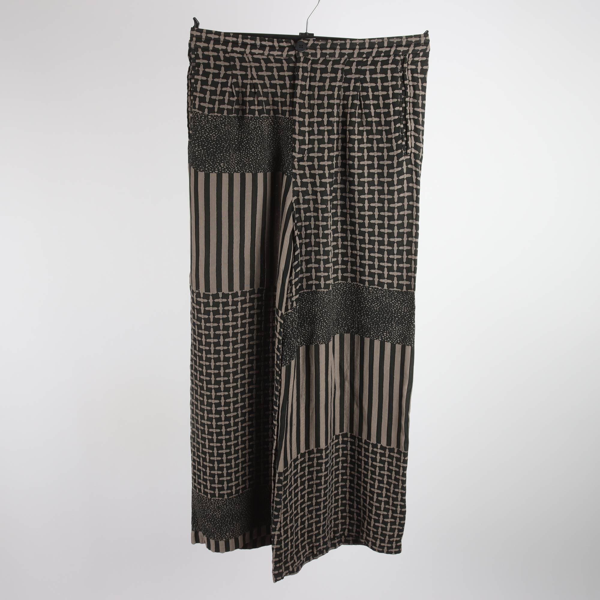Byxor, Rodebjer, svart, beige, stl. 38.