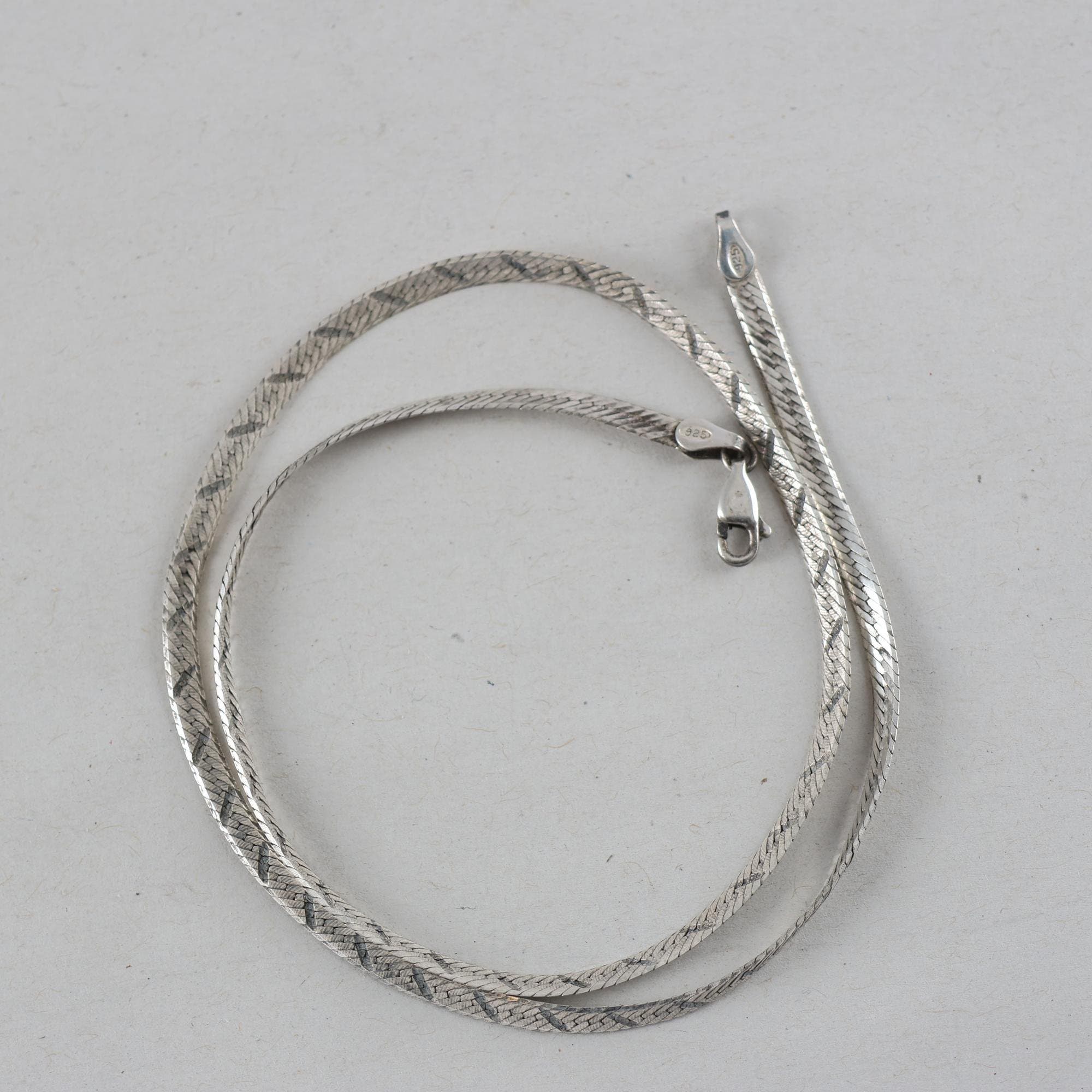 Manglat halsband, silver